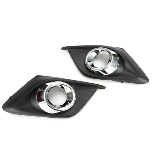 pair of clear lens fog light kits with bezels, wires, and switches 2014-2016 for Mazda 3.