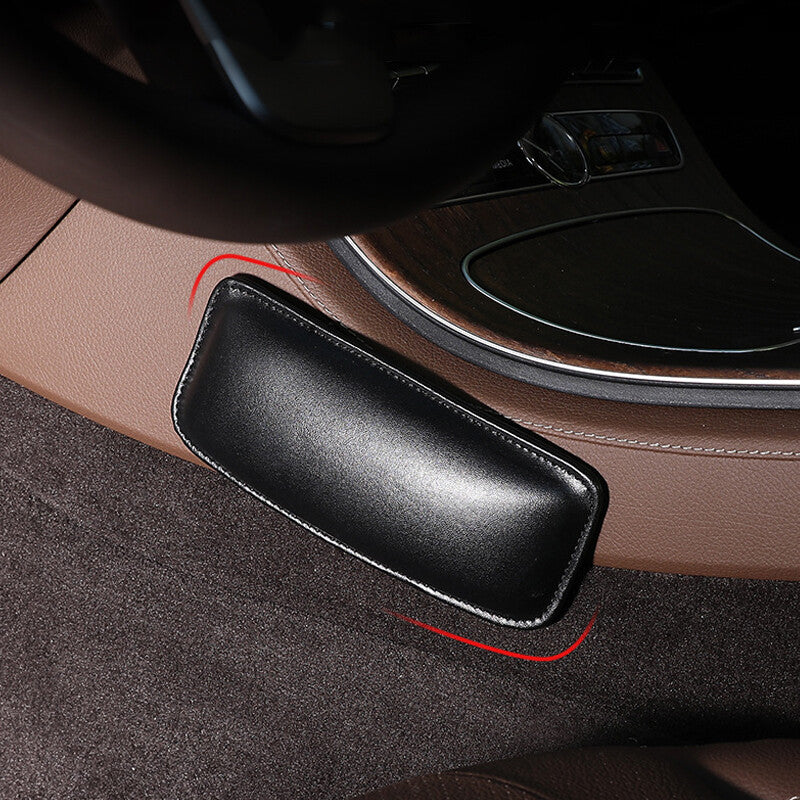 Two knee pads for car dashboard driver's side to relieve knee pain.