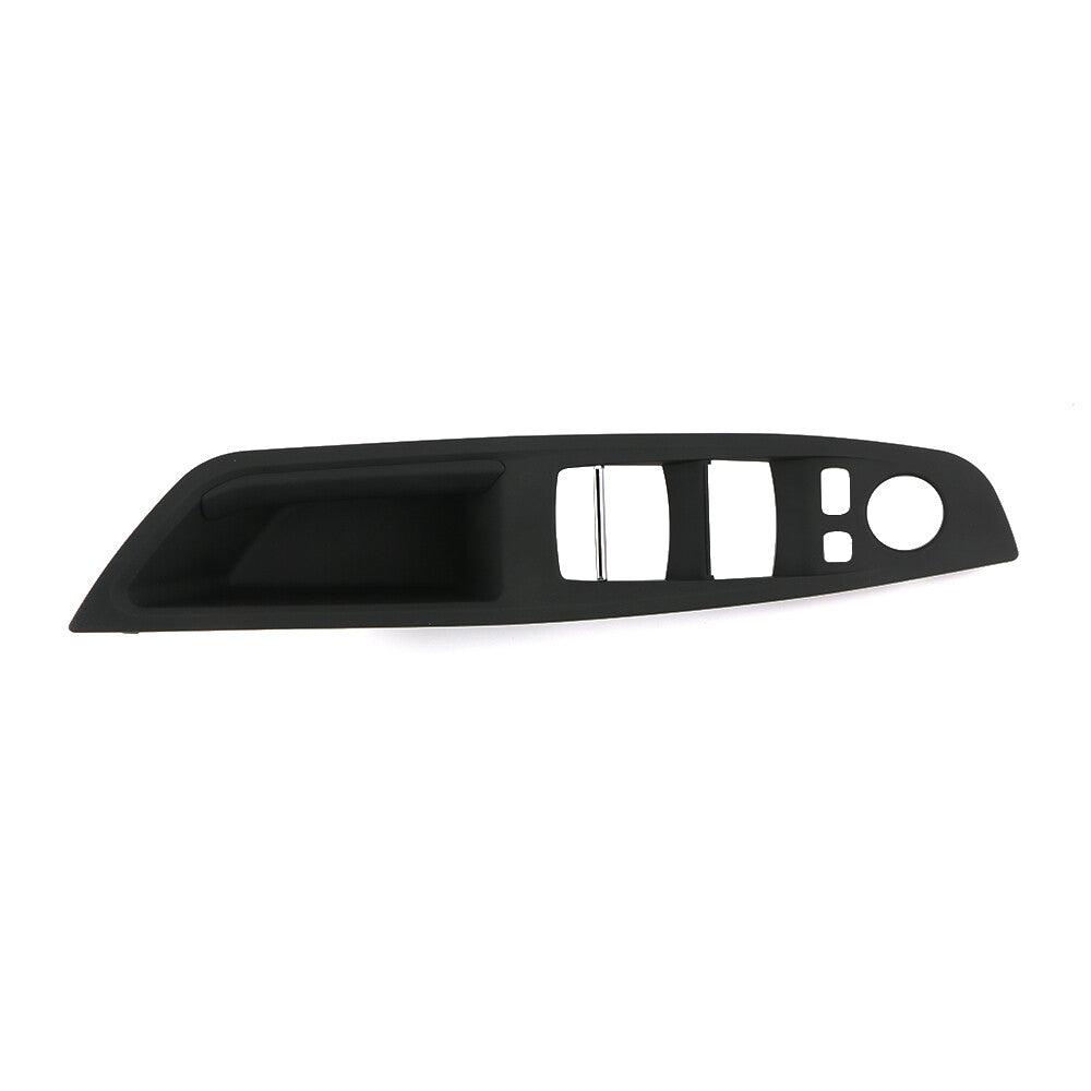 Black trim around the front right door window control panel for BMW F10