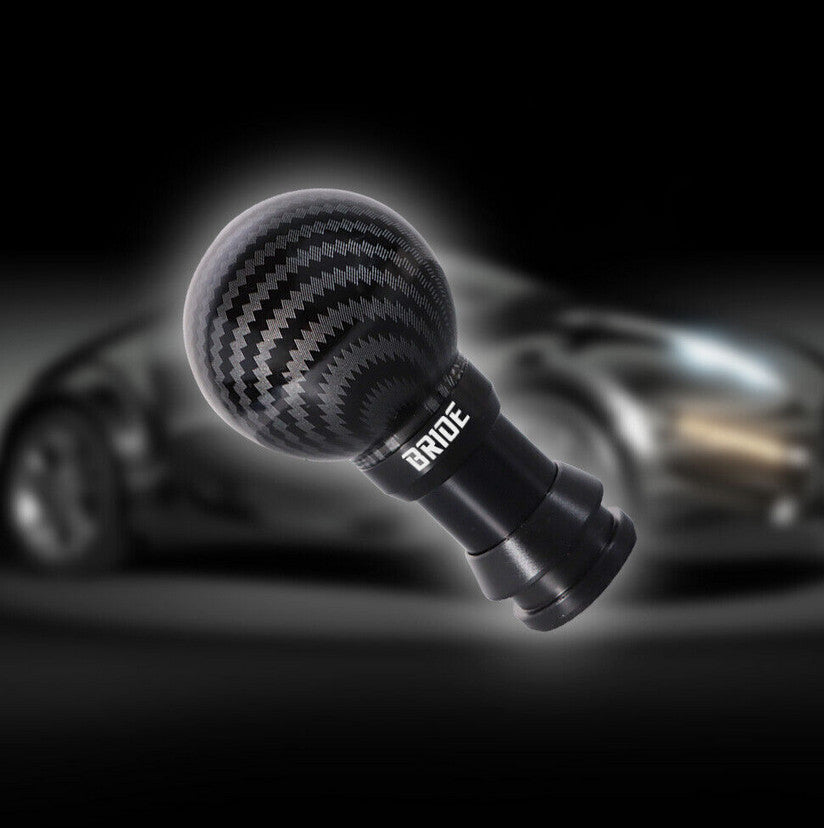 black protective cover for car gear shifters and racing transmissions, suitable for Mitsubishi vehicles.