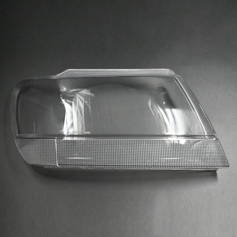 A pair of headlight lens covers for Jeep Grand Cherokee 1999-2004