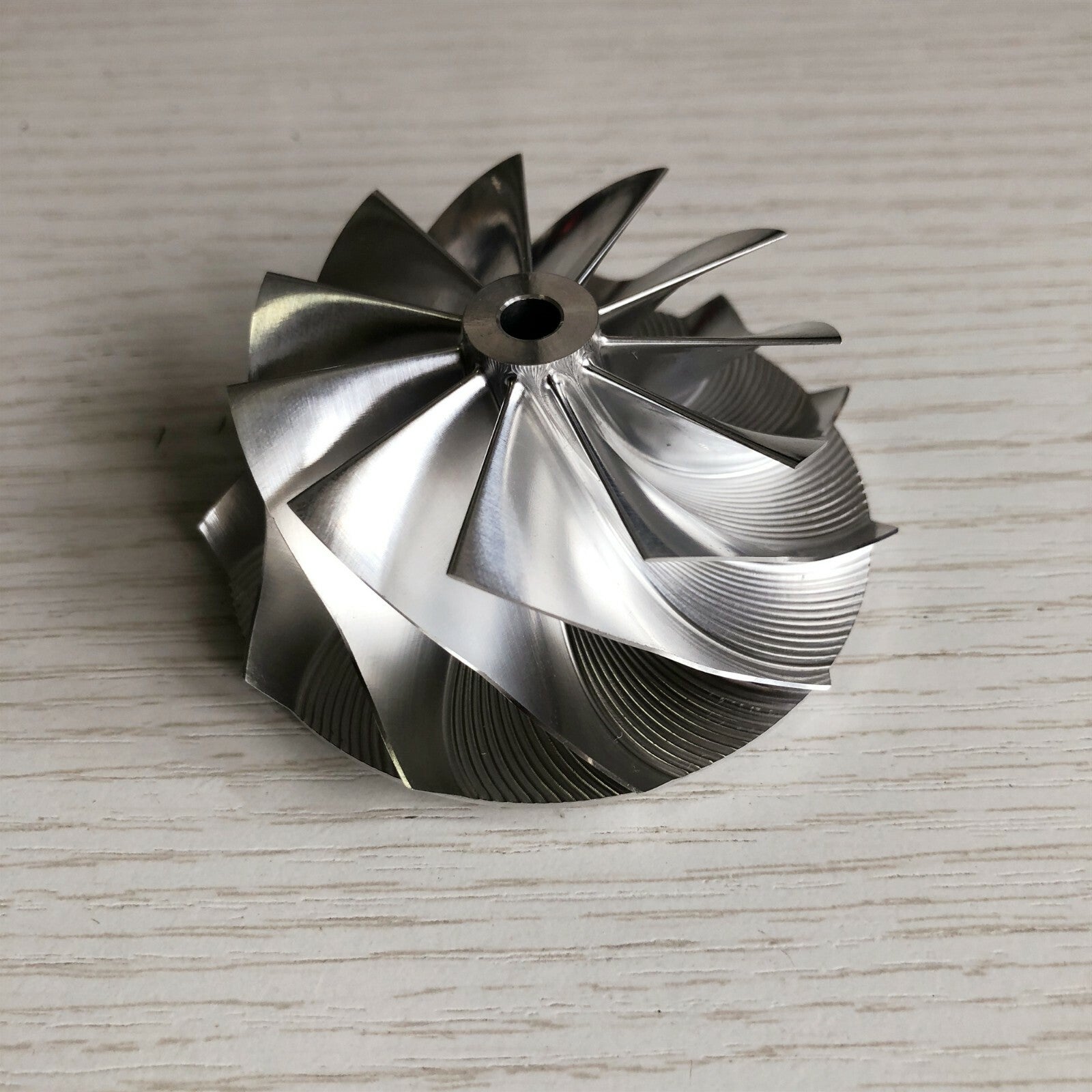 K16 54.70/67.00 mm 11+0 Blade Turbine Milling/Blank Compressor Wheel