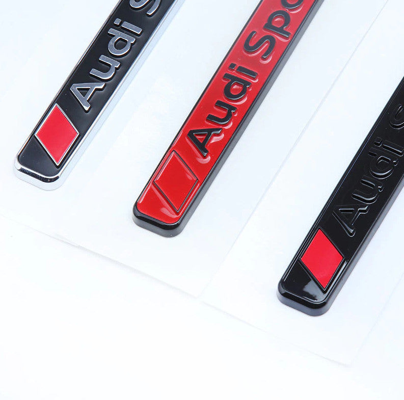 Carbon-plated side fender and window badge decals for Volvo XC40 cars.