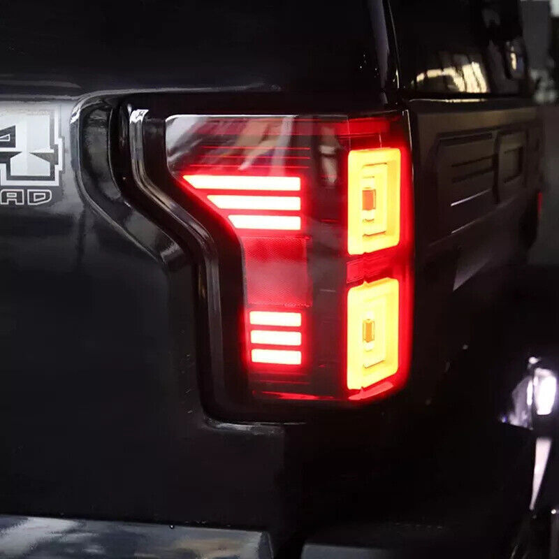 A pair of smoke-style LED taillights with sequential turn signals for the for Ford F-150 2015-2020.