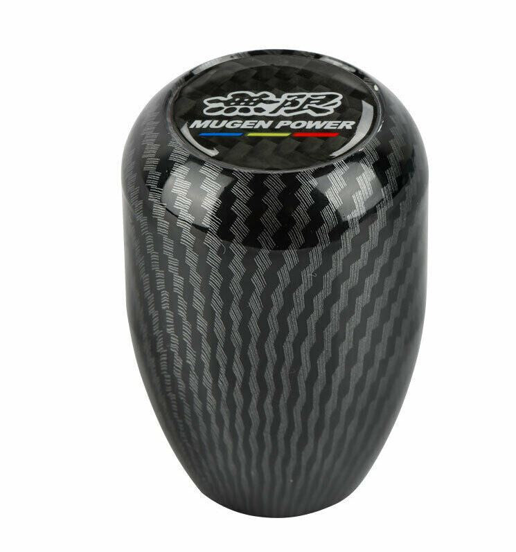 The Mugen carbon fiber exterior for manual shift levers is suitable for Honda for Civic and for Acura vehicles.