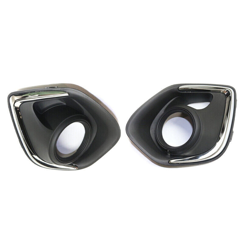 A pair of front bumper fog light bezel trims for the 2013-2015 for Mitsubishi Outlander Sport.