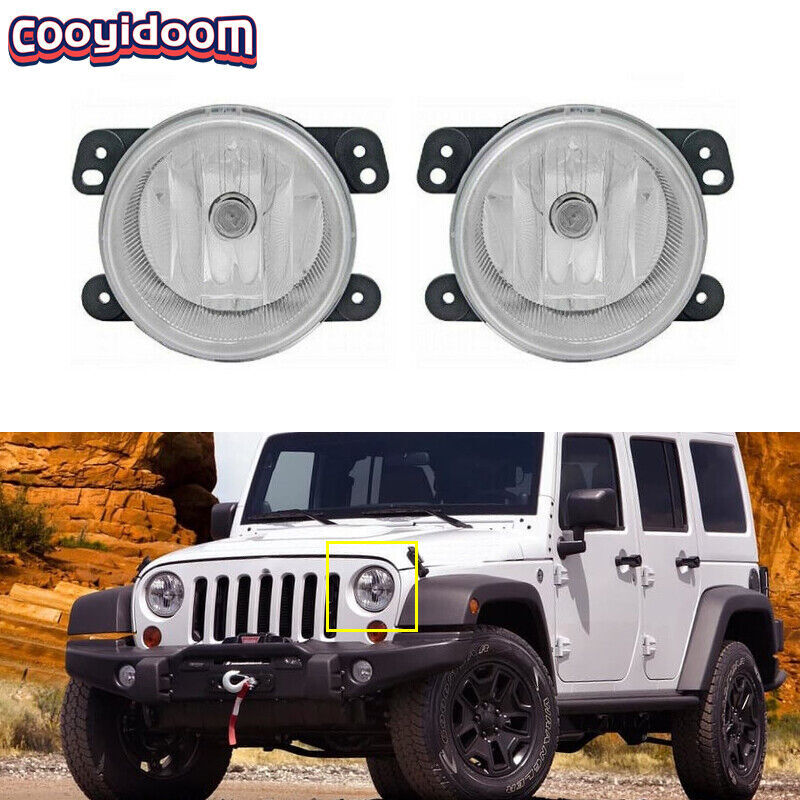 A pair of traveling Wranglers, Cheaokee, 2010-2017, driving with fog lights.