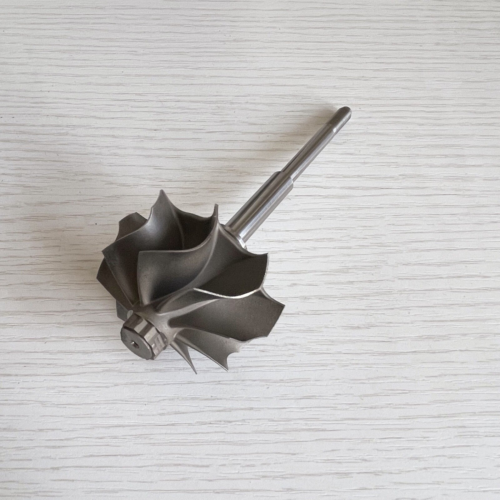 TD05HR Reverse 49.1X56 mm 9-blade turbine wheel/turbine shaft and wheel