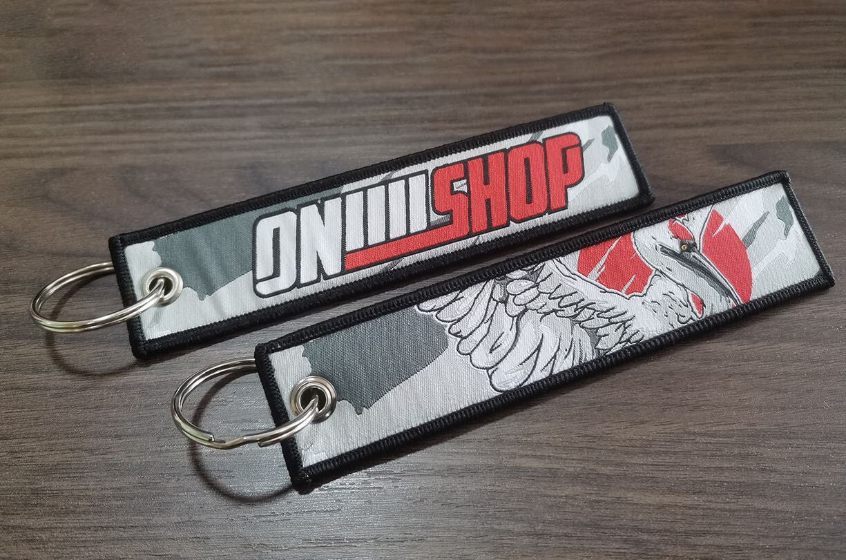 Car keychain/key ring embroidered nylon car accessories, gray and red, suitable for Nissan .