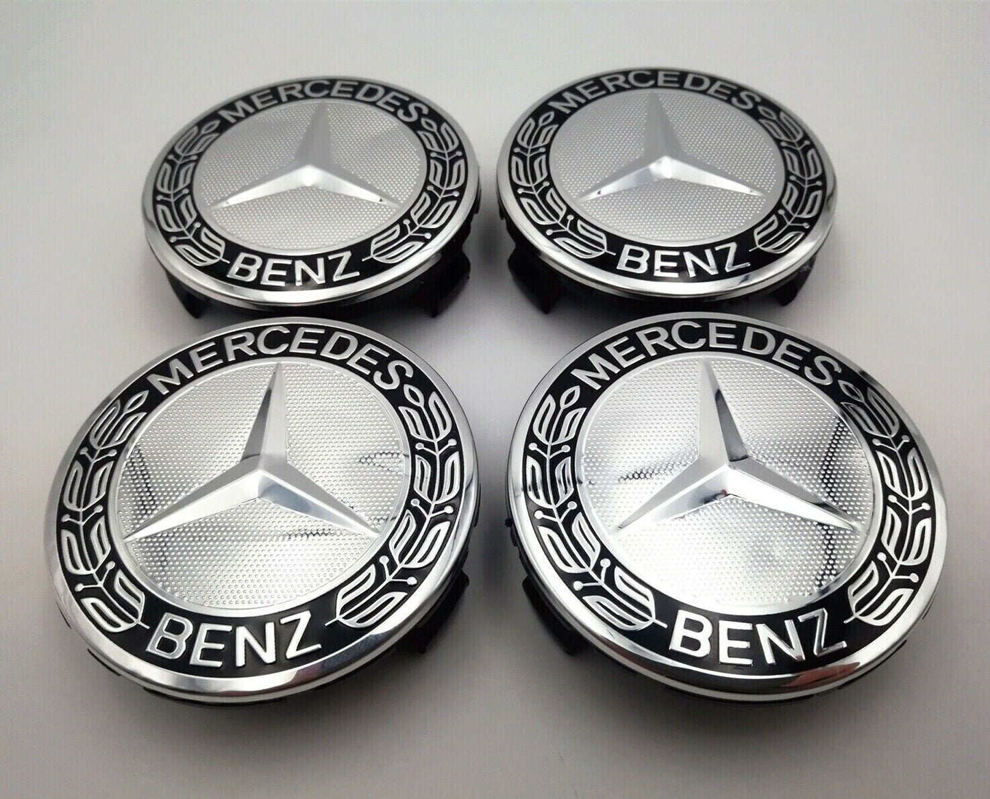 4 sets of 75mm wheel center caps and hubcaps for Mercedes-Benz AMG black rims.