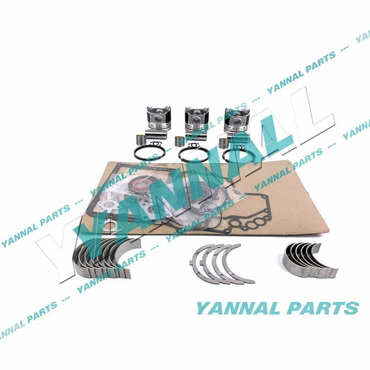 new L2000 overhaul and rebuild kit with piston rings, washers, and bearings suitable for Kubota engines.