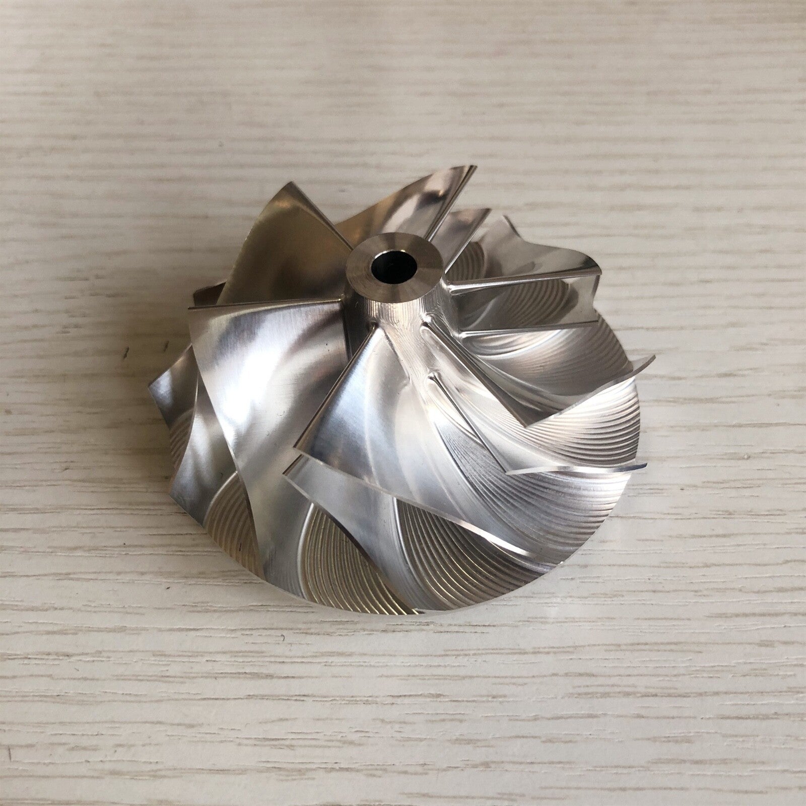 T04S 409535-0001 59.05/76.07 mm 6+6 Blade Turbine Milling/Blank Compressor Wheel