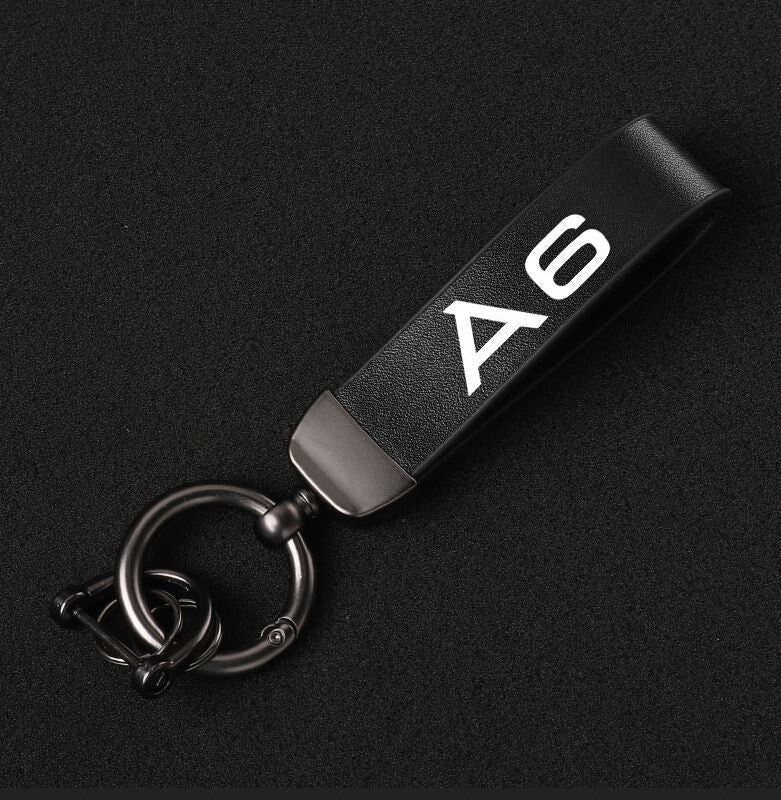 Suitable for Audi for A6 car keychain/key ring, black leather horseshoe buckle gift.