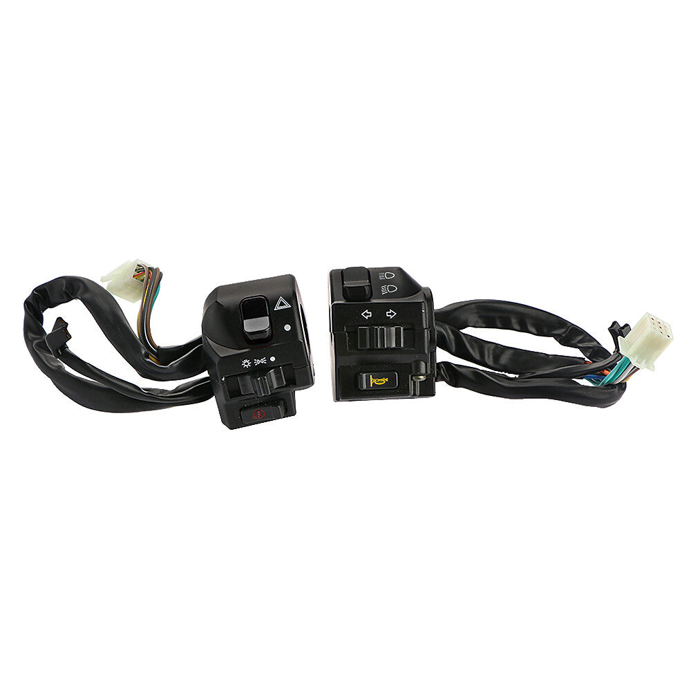 A pair of motorcycle 7/8 inch handlebar horn buttons, turn signals, and electric start switches.