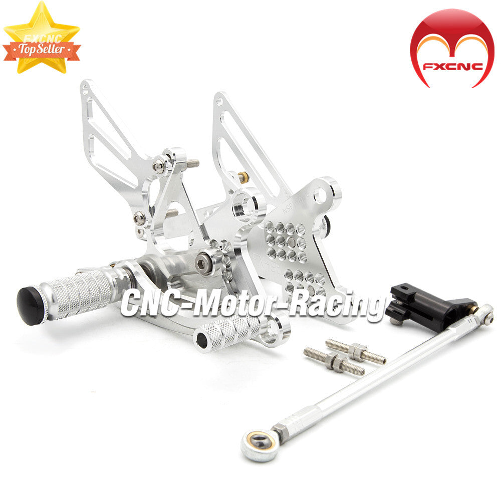CNC gear-type foot spikes suitable for Honda NSF100 and NSR50 (2004-2010) aluminum silver.