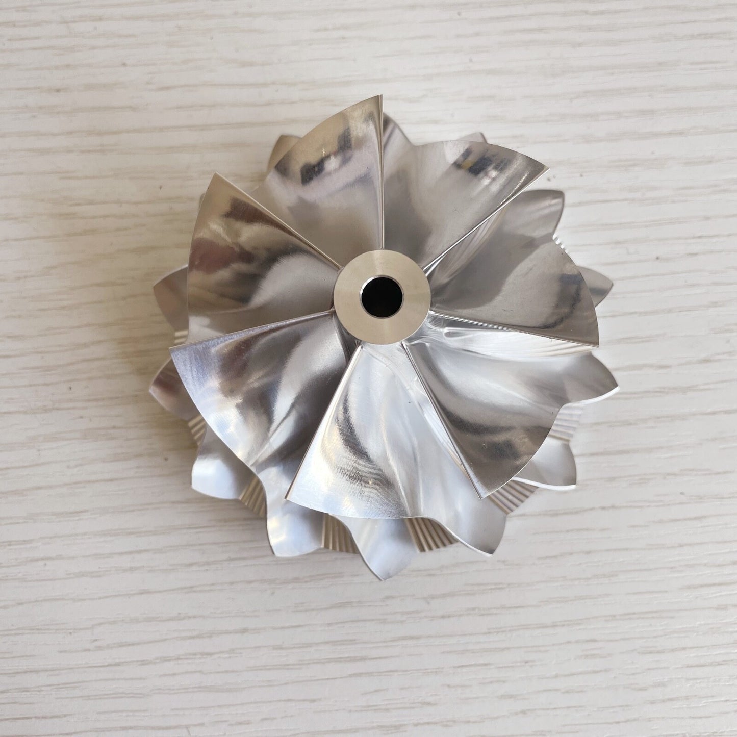 G35-1050 68.07/84.45 mm 7+7 Blade Performance Turbine Blank Compressor Wheel