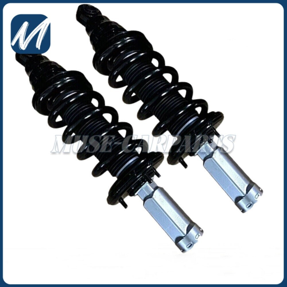 A pair of 822KAS255 rear L+R shock absorber assemblies for Jaguar XF with EDC 10-12.