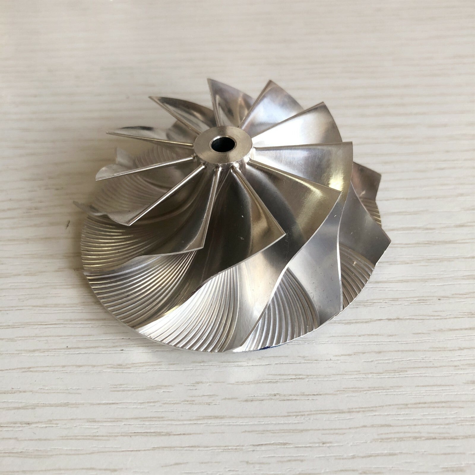 K16 Reverse 59.00/78.00 mm 11+0 Blade Turbine Milling Compressor Wheel
